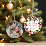 Elegant First Christmas Greenery Wedding Photo Ornament<br><div class="desc">Our First Christmas ornament design for the newlywed couple features a beautiful watercolor wreath design with green leaves and red berries holiday greenery foliage that frames elegant custom Mr and Mrs Last Name and year married text. Customize with your favorite wedding photo on the reverse side.</div>