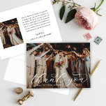 Elegant Flourish Script Wedding Photo Thank You Card<br><div class="desc">Graceful calligraphy with sweeping flourish tails spells out "thank you" across a full-bleed wedding photo, giving this folded card a timeless, romantic feel. The back includes a second photo alongside a heartfelt, editable message and space for your names and date. The bold, flowing script suits formal and classic weddings beautifully....</div>