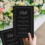 Elegant Folding Wedding Program Monogram Black<br><div class="desc">This program is an 8.5 x 11 page that requires you to fold it to assemble.  The white border is editable in thickness,  size and color. Classic understated black custom color ink wedding program with a modern touch featuring the elegant script of your initials.</div>