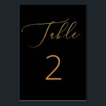 Elegant Formal Black Tie Wedding | Gold Script Table Number<br><div class="desc">Add timeless elegance to your wedding reception with this black and gold table number card. Featuring a black background and classic gold style script, this design blends sophistication and simplicity. The gold lettering is printed (not real foil), giving you the luxe look of metallic calligraphy without the added cost. Ideal...</div>