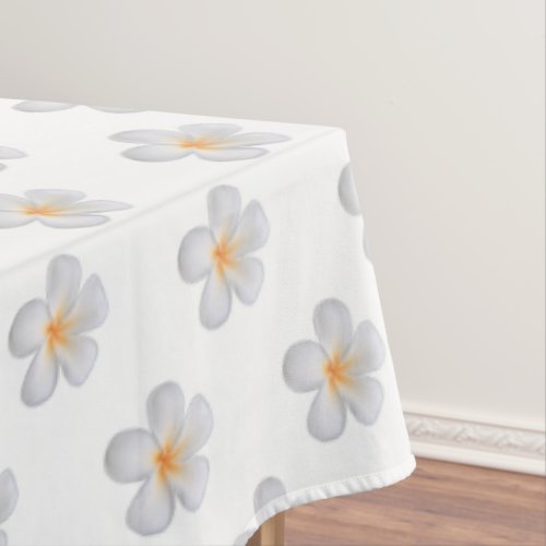 Elegant Frangipani Plumeria Flowers on White Tablecloth