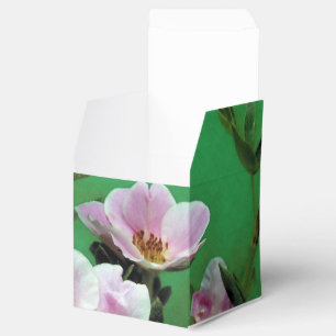 Elegant, fresh wild pink rose flowers in green favor boxes