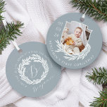 Elegant Garland Wreath Crest Baby First Christmas Metal Ornament<br><div class="desc">Elegant winter garland crest baby's first Christmas photo & monogram ornament. Our personalized ornament features our hand-drawn winter garland wreath design with a personalized baby photo and birthday. The revised side displays our elegant winter garland wreath and custom monogram, baby birth stats, and name. Note: color can be changed using...</div>