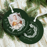 Elegant Garland Wreath Crest Baby First Christmas Metal Ornament<br><div class="desc">Elegant winter garland crest baby's first Christmas photo & monogram ornament. Our personalized ornament features our hand-drawn winter garland wreath design with a personalized baby photo and birthday. The revised side displays our elegant winter garland wreath and custom monogram, baby birth stats, and name. Note: color can be changed using...</div>