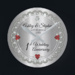Elegant Garnet Diamonds 1st Wedding Anniversary  Round Clock<br><div class="desc">Opulent elegance frames this 1st wedding anniversary design in a unique scalloped diamond design with center teardrop diamond with heart-shaped sapphire accents and faux added sparkles on a silver-tone gradient. Please note that all embellishments are printed and are only made to appear as real as possible in a flat, printed...</div>