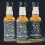 Elegant Gold 50th Birthday Script Liquor Bottle Label<br><div class="desc">Lovely faux gold glitter confetti highlights on the top and bottom border. All text is adjustable and easy to change for your own party needs. Great elegant 50th birthday template design. blue wood textured background.</div>
