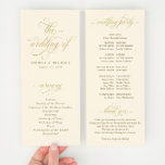 Elegant Gold and Cream Calligraphy Wedding Program<br><div class="desc">Discover the epitome of refined elegance with our Cream and Gold Wedding Program. Adorned with luxurious, ornate swirly calligraphy, this program seamlessly marries opulence with practicality, offering a comprehensive guide to your unforgettable day. The front of the program presents the intricate details of the ceremony, exquisitely written in gold against...</div>
