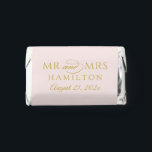 Elegant Gold and Pink Monogram Mr and Mrs Hershey's Miniatures<br><div class="desc">A luxurious miniature wedding favor featuring "Mr and Mrs" in stately serif typography with the couple's names, surname, and date styled together as a formal monogram lockup. Warm gold lettering on a soft pink background creates a romantic, elevated design. Personalize all text for a stunning reception favor. All text is...</div>