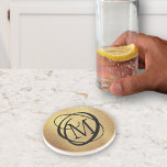 Elegant Gold Brushed Metal Monogram Stylish Coaster<br><div class="desc">Elegant,  unique monogrammed coaster in black and faux gold brushed metal. ASSISTANCE:  For help with design modification or personalization,  color change,  transferring the design to another product or if you would like coordinating items,  contact the designer BEFORE ORDERING via the Zazzle Chat MESSAGE tab or email at makeitaboutyoustore@gmail.com.</div>
