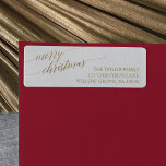 Elegant Gold Calligraphy Merry Christmas Label<br><div class="desc">These elegant gold calligraphy Merry Christmas return address labels are perfect for a simple holiday card or invitation. The neutral design features a minimalist label decorated with romantic and whimsical faux gold foil typography. Please Note: This design does not feature real gold foil. It is a high quality graphic made...</div>