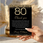 Elegant Gold Diamonds 80th Birthday Thank You Card<br><div class="desc">Express your gratitude in sophisticated style with this Elegant Gold Diamonds 80th Birthday Thank You Card. Designed to complement a luxurious milestone celebration, this card features a stunning black and gold palette with sparkling diamond accents—perfect for adding a touch of glamour to your thank-you messages. Whether paired with your 80th...</div>