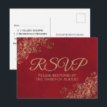 Elegant Gold Frills on Crimson Red Wedding RSVP Postcard<br><div class="desc">These RSVP postcards will make it easy for your guests to respond to your wedding invitation. They feature a sophisticated classy design with gold text on a lush marbled red background. The corners of the card are decorated with a lacy curly floral filigree. The back has a place to indicate...</div>