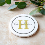 Elegant Gold Gray Round Custom Monogram Initial Coaster<br><div class="desc">Elegant round personalized beverage drink coaster design features a classic custom serif monogram initial in a gold color with your last name in modern gray calligraphy script against a clean white background. A simple gray circle frames the design. Color scheme can be customized to coordinate perfectly with your home decor....</div>