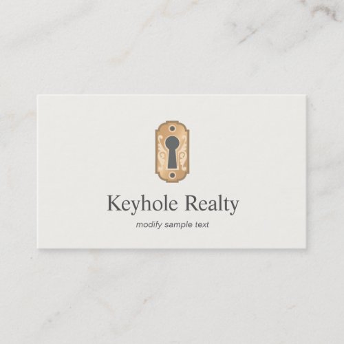 Elegant Gold Key Hole Logo Real Estate Business Card