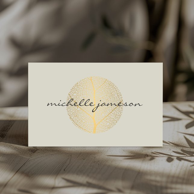 Elegant Gold Leaf Logo on Light Tan Business Card