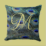 Elegant Gold Monogram Colorful Peacock Feathers Throw Pillow<br><div class="desc">Elevate your style with our luxurious Peacock Feathers throw pillow design featuring your stunning gold monogram. This exquisite design blends the vibrant beauty of colorful peacock feathers with the timeless elegance of a personalized gold letter, creating a truly unique statement for your home decor that is perfect for adding a...</div>