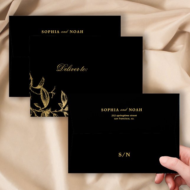 Elegant gold monogram floral black wedding envelope (Creator Uploaded)