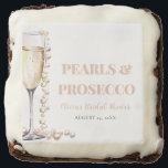 Elegant Gold Pearls and Prosecco Bridal Shower Brownie<br><div class="desc">The "Elegant Gold Pearls and Prosecco Bridal Shower Brownie" is a decadent dessert that adds a touch of sophistication to any bridal celebration. These rich and indulgent brownies are adorned with elegant designs inspired by gold pearls and the effervescence of Prosecco. Baked to perfection and beautifully presented, these brownies are...</div>