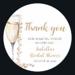 Elegant Gold Pearls and Prosecco Bridal Shower Classic Round Sticker<br><div class="desc">The Elegant Gold Pearls and Prosecco Bridal Shower Sticker is a sophisticated and stylish addition to any bridal shower celebration. With its elegant design featuring gold pearls and prosecco champagne, this sticker adds a touch of luxury and refinement to favors, envelopes, or decor. Whether used to seal envelopes, adorn gift...</div>