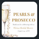 Elegant Gold Pearls and Prosecco Bridal Shower Square Sticker<br><div class="desc">The "Elegant Gold Pearls and Prosecco Bridal Shower Sticker" is a charming addition to any bridal celebration. Adorned with elegant designs inspired by gold pearls and the effervescence of Prosecco, these stickers add a touch of sophistication to invitations, favors, or décor items. Meticulously crafted and beautifully presented, these stickers are...</div>