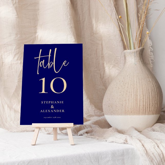 Elegant Gold Script Navy Names Date Table Number (Creator Uploaded)