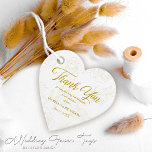 Elegant Gold Script Romantic Floral Wedding Favor Tags<br><div class="desc">Infuse your wedding favors with a touch of personalized elegance with these gorgeous gold script romantic floral wedding favor tags. Each tag is delicately designed with beautifully ornate floral patterns and accented with your desired text in stunning gold script. These tags are not only visually appealing but also represent the...</div>