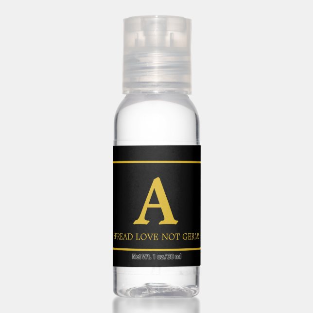Elegant golden monogram on black hand sanitizer (Front)