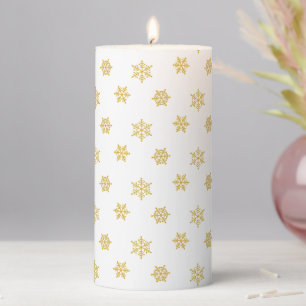 Elegant Golden Snowflake Pattern on White Pillar Candle
