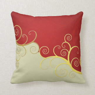 Elegant golden swirls on red and cream throw pillow