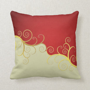Elegant golden swirls on red and cream throw pillow