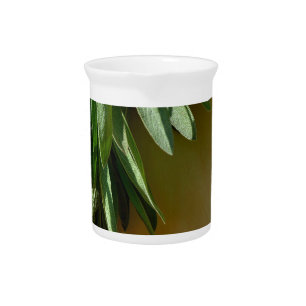 Elegant green botanical leaves Fresh-cut herbs Drink Pitcher