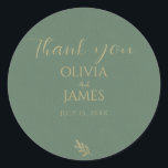 Elegant Green & Gold Minimalist Thank You Wedding Classic Round Sticker<br><div class="desc">A classy rustic modern sage emerald green and gold minimal wedding favor sticker. Which features a green and gold themed design that has line art eucalyptus leaf . With a minimalist rustic chic design that has the wife and husband's names gold and whimsical thank you calligraphy typography and date ....</div>