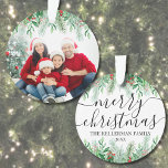 Elegant Greenery Merry Christmas Family Photo Ornament<br><div class="desc">Personalized Name Elegant Greenery Merry Christmas Script Family Photo Custom Ornament Dated. Create a personalized holiday keepsake with this elegant Christmas ornament, featuring a large family photo framed by lush botanical greenery. The top showcases a seamless white gradient that blends into pine branches, evergreen leaves, and red holly berries, offering...</div>