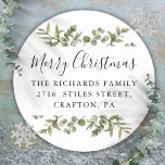 Elegant Greenery Merry Christmas Return Address Classic Round Sticker<br><div class="desc">Watercolor greenery frames elegant script Merry Christmas typography on these elegant return address stickers. Personalize with your family name and address. Designed by Thisisnotme©</div>