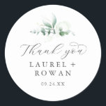 Elegant Greenery Thank You Wedding Favor Sticker<br><div class="desc">These elegant greenery thank you wedding favor stickers are perfect for a simple wedding reception. The modern elegant design features a natural botanical arrangement of eucalyptus, leaves and plants with a subtle mint green watercolor wash accent. Personalize the sticker labels with your names, the event (if applicable), and the date....</div>