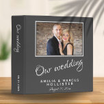 Elegant Grey Wedding Photo Album 3 Ring Binder<br><div class="desc">Elegant Grey and White Wedding Photo Album. An elegant dark gray wedding photo album for your wedding day memories with a trendy script in white colors. Easily personalize all the text on the front and on the spine and the wedding photo on the front - make your own unique photo...</div>