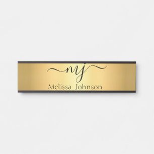 Elegant initials on gold door sign
