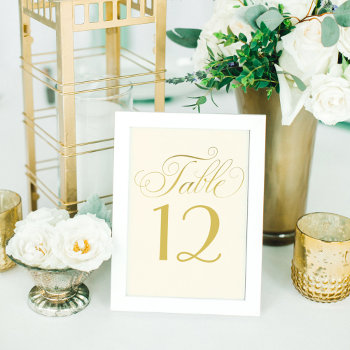 Elegant Ivory And Gold Calligraphy Script Wedding Table Number by Plush_Paper at Zazzle