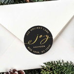 Elegant Joy Black & Gold Christmas Return Address Classic Round Sticker<br><div class="desc">This stylish sticker features an elegant gold joy script with the family name and return address on a black background (changeable background color). For more advanced customization of this design,  please click the "customize further" link.</div>