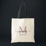 Elegant Lavender Personalized Bridesmaid Name Tote Bag<br><div class="desc">Classic girly minimalist and elegant wedding tote bag. this design features a simple and modern purple lavender and black script monogram. You can personalize with an initial and name in script. This purple tote bag will be perfect personalized gift for wedding party - maid of honor, bridesmaids, mothers of the...</div>