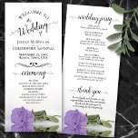 Elegant Lavender Purple Rose Romantic Wedding Program<br><div class="desc">This beautiful wedding program features an elegant design with a single long stemmed light purple or lavender colored rose lying on its side reflecting in water. The titles are written in fancy script calligraphy, and there is space for your ceremony and wedding party details, as well as a short thank...</div>