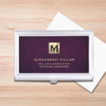 Elegant Leather Luxury Gold Monogram Business Card Case<br><div class="desc">Simple modern luxury design with brushed metallic gold initial logo medallion with personalized name,  title,  company name or custom text below in classic block typography on a purple leather textured background. Personalize for your custom use.</div>
