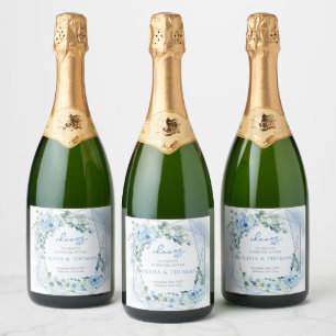 Elegant light pastel blue flowers and eucalyptus sparkling wine label