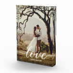 Elegant Love Script Wedding Photo Newlyweds Framed<br><div class="desc">Encase the moment your hearts united in a showcase of pure elegance with the Elegant Love Script Wedding Photo Newlyweds Framed Block from LD Design Loft. This exquisitely finished frame is a vessel for your cherished memories, a portal to the day two souls became one under the banner of love....</div>