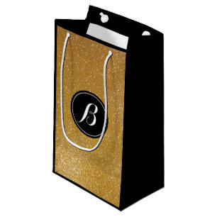 Elegant luxury gold glitter monogram gift bag