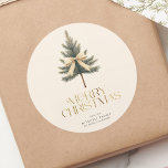 Elegant Merry Christmas Pine Tree Bow Family Classic Round Sticker<br><div class="desc">Add a festive touch to your gifts with these elegant "Merry Christmas" stickers! Featuring gold script,  a pine tree bow,  and your custom family name,  they're perfect for personalizing your holiday packages with style and warmth.</div>