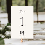 Elegant Minimal Bow Wedding  Table Number<br><div class="desc">Capture the essence of elegance and simplicity with our minimalist wedding table number featuring a charming hand-drawn bow design. The sophisticated color scheme of gray and ecru adds a touch of refinement to this timeless piece,  perfect to celebrate your special day in style.</div>