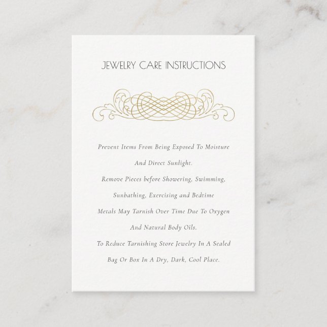 Elegant Minimal Ornate Gold Divider Jewelry Care Business Card (Front)