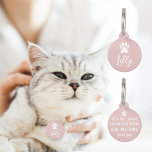 Elegant Minimal White Pet Paw with Contact Details Pet ID Tag<br><div class="desc">Blush Pink personalized pet ID tag with white stylized pet paw print and customizable pet name on the front and text template with phone number on the back. The background color can be changed as desired. This easy to customize pet collar pendant is a nice gift idea for pet owners...</div>