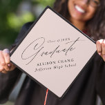 Elegant Minimalist Blush Graduation Cap Topper<br><div class="desc">Elegant graduation cap topper featuring "Graduate" displayed in a beautiful black calligraphy script with a blush background. Personalize the graduation cap topper with the graduate's name,  school name,  and graduation year.</div>